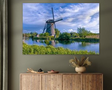 Polder mill in the landscape of world heritage site Kinderdijk.
