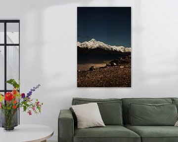 A starry sky with beautiful mountains covered with snow