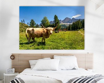 Cow in the meadow with the Rosengarten in the background by Rene Siebring