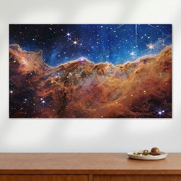 "Falaises cosmiques" dans la nébuleuse de la Carène sur NASA and Space