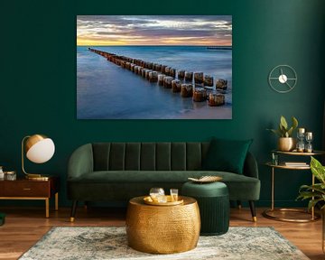 Sunset: groynes at the Baltic Sea coast near Ahrenshoop