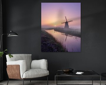 Sunrise at the Hempenserpolder mill during a foggy morning by Thea.Photo