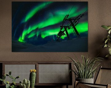 Circling Northern Lights above the ski elevator by Martijn Smeets