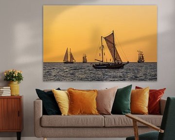 Sailing ships in the sunset at the Hanse Sail in Rostock by Rico Ködder