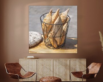Bread basket with crusty white bread by ManfredFotos