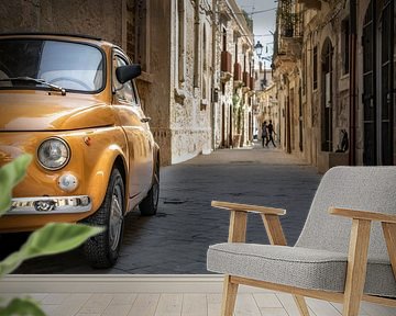 An old Fiat in the center of Syracusa, Sicily, Italy. by Ron van der Stappen