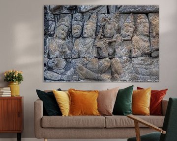 Stenen detail boeddhistische figuren Java van Sander Groenendijk