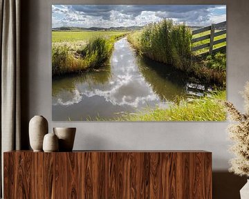 Water landschap met weerspiegeling van wolken van Lisette Rijkers