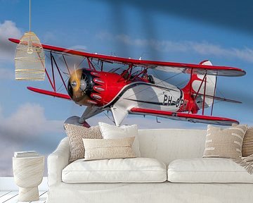 Classic red and white Double Decker Airplane in a bird's eye view by Planeblogger