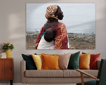 Senegalese woman with baby on her back