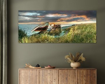 Fishing boat on seawall along of the Frisian coast on the IJssel Lake