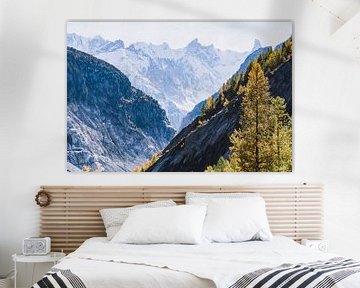 Mountain landscape with snow-capped mountains and autumn colors