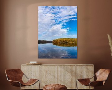 View over the lake Schmaler Luzin to the autumn field mountains