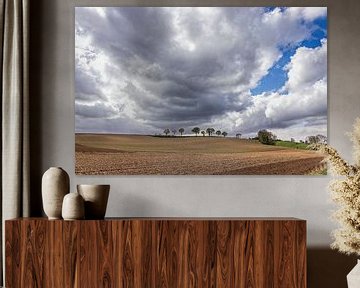 Wolkenstraat über dem Feld Mamelis von Rob Boon