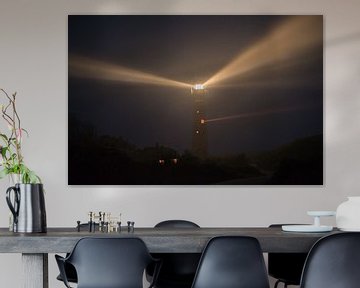 Schiermonnikoog lighthouse in the dunes during a foggy night by Sjoerd van der Wal Photography