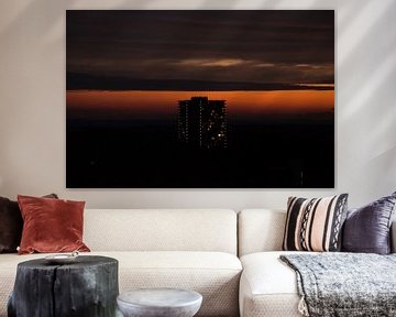 Zonsondergang bij een flat van Roel Van Cauwenberghe
