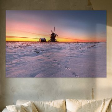 Windmill de Koker in the snow during sunrise by Pieter Struiksma