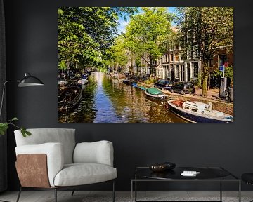 Houseboats in canal in Amsterdam by Dieter Walther