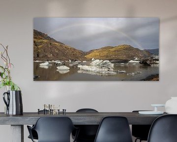 Rainbow over glacial lake of Sólheimajökull by Albert Mendelewski