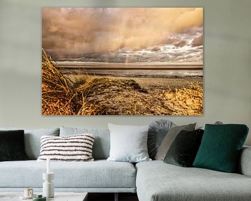 Sunset and rain -a rainbow over the Wadden Sea by HGU Foto