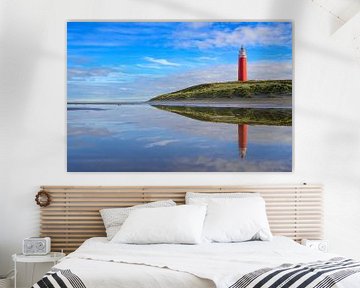 Vuurtoren van Texel aan het strand tijdens een rustige herfstmiddag