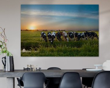 Zonsondergang met koeien in de polder van Martin Bredewold
