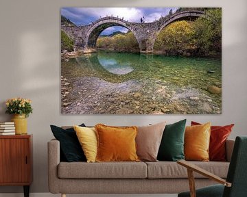 The old stone bridge of Plakida or Kalogeriko of Zagori at the region of Ioannina in Epirus Greece by Konstantinos Lagos