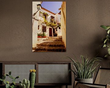 Narrow alley and stairs in Granada by Travel.san