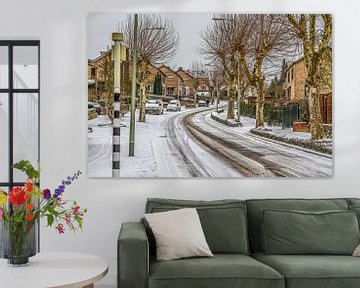 St. Remigiusstraat Simpelveld in de sneeuw von John Kreukniet