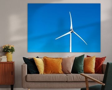 Wind turbine with a clear blue sky in the background by Sjoerd van der Wal