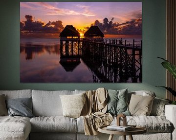 Sunset at jetty house over ocean by Barbara Riedel