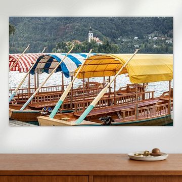 beautiful wooden tour boats on lake Bled in Slovenia by Eric van Nieuwland