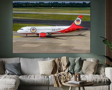 Air Berlin Airbus A320 in den Farben der Fan Force One Bitburger Bier. von Jaap van den Berg