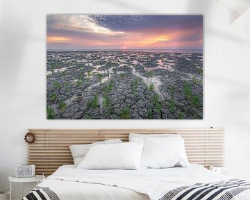 zonsondergang aan de waddenzee bij Koehool tijdens droogte van Thea.Photo