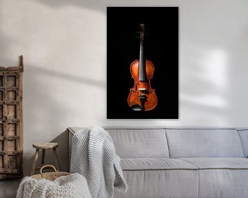 19th century violin on black background