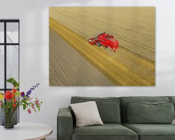 Wheat harvesting during summer seen from above by Sjoerd van der Wal Photography