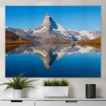 The Matterhorn at Zermatt reflection in the mountain lake Stellisee by Menno Boermans