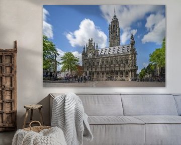 Middelburg town hall in Zeeland netherlands with clouds and people