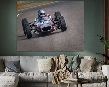 klassisches Formelauto, das aus der Gerlach-Kurve in Zandvoort kommt von Andre Bolhoeve