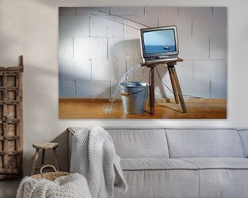 Old vintage tv on a slanted wooden stool shows a film of a ship  by Maren Winter