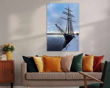 Sailing ship in the city harbour in the Hanseatic city of Rostock in winter by Rico Ködder