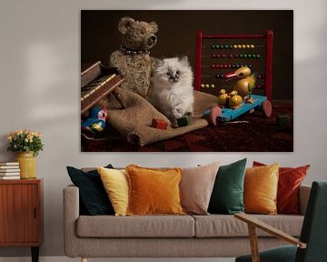 No Competition, kitten among antique toys