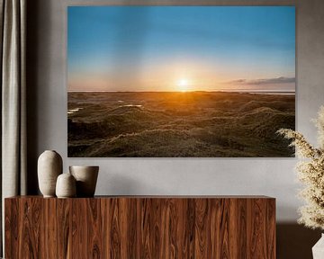 Vue panoramique du coucher de soleil dans les dunes de Schiermonnikoog sur Sjoerd van der Wal Photographie