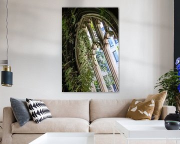 Overgrown church window. by Floyd Angenent