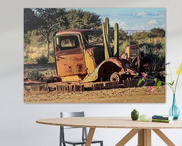 Vintage cars in the Namibian desert by Roland Brack