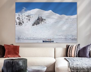 Get schuo the Ocean Nova between the high cliffs of Orne Island, Antarctia by Hillebrand Breuker