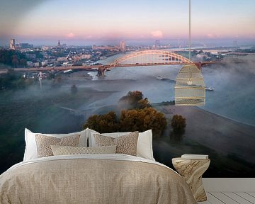 Nijmegen's skyline on a foggy autumn morning by Luc van der Krabben