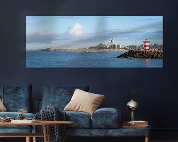 Panoramic view over Scheveningen Pier, beach, and harbor entrance with light house by John Duurkoop