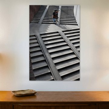 Cyclist on stairs