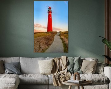 Schiermonnikoog lighthouse in the dunes during sunset